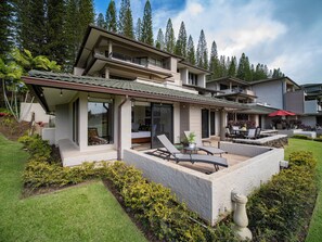 Stay in a spacious, luxury villa featuring private outdoor spaces, nestled within the lush Kapalua resort community.