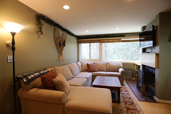 Relax in this Waterville Valley Living Room with Sofa Bed
