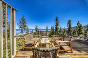 A spacious deck offers the perfect place to soak up the sun and take in the panoramic lake views.