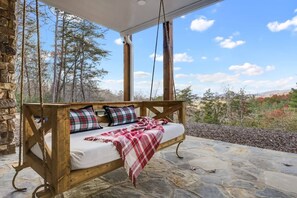 Enjoy morning coffee or evening wine on a private deck overlooking the stunning highland scenery.