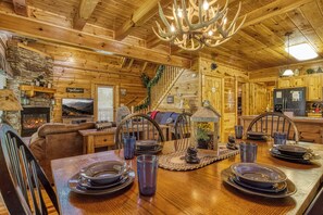 Smoky Mountain Cabin "A Stone's Throw" - Dining table living room and kitchen