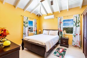 Bedroom 2 also with a queen bed, nightstands, AC & cheerful vibes!