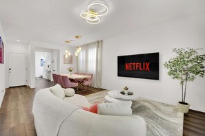 Stream all your favorites from Netflix, Prime Video, YouTube, etc. in this well appointed living room