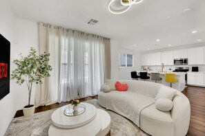Stream all your favorites from Netflix, Prime Video, YouTube, etc. in this well appointed living room