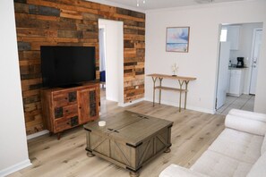 Living Room comes with Smart TV with Netflix, Amazon Prime, and YouTube TV