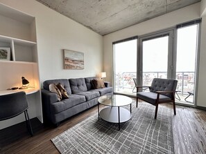 Comfortable living room with private balcony
