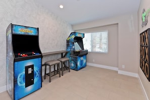 Inside you will find 2 arcade machines (no coins required)
