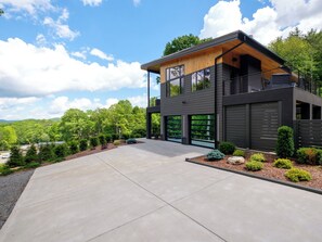 LED lit double door garage and driveway.