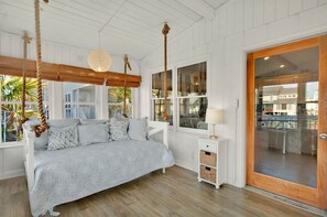 Extra twin bed in sunroom