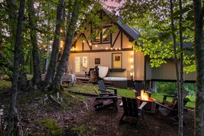 Twilight is one of the prettiest times at the house. The front porch and picnic table offer the perfect location to wind down after a day on the mountain. A hot tub and firepit provide the warmth needed to stay comfortable during the crisp mountain evenin