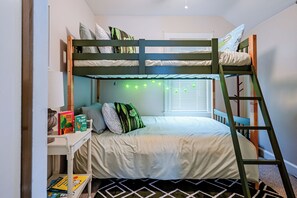 Cozy up in the fun bunk beds in this bedroom. 