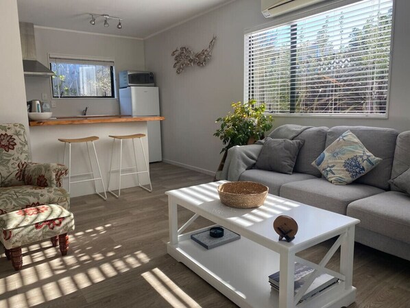 Lounge area looking through to kitchen