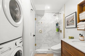 Enjoy the convenience of an in-unit washer and dryer in our modern bathroom