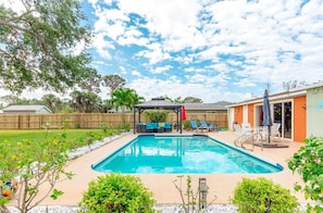 Private pool with plenty of entertainment space and a grill for entertaining