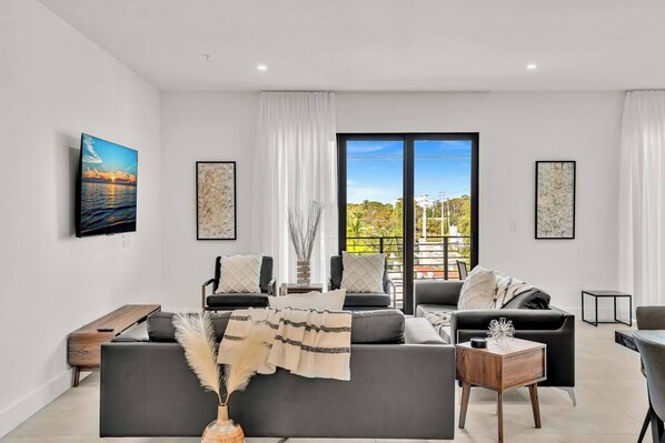 Unwind with a cup of coffee and a good book in this inviting living room.