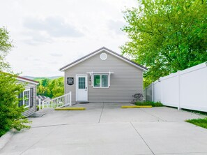 Parking on the right side for one car. 
The cottage is nestled onto a quiet and peaceful street, making it the perfect getaway spot to disconnect and recharge!