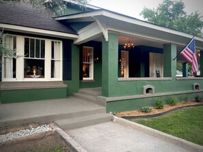 850 sq ft front porch with rockers, chairs and table