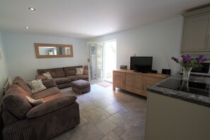 Kitchen seating area leading onto the rear garden