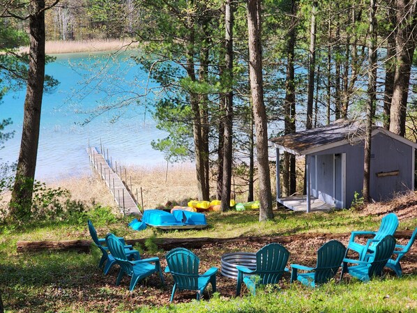 Large fire pit overlooking the lake