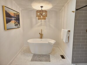 Soaking tub in master bathroom