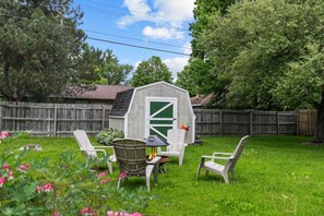 Enjoy relaxing in the Adirondack chairs around the propane fire pit.