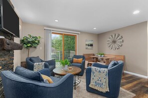 Living area has plenty of seating for family and friends.