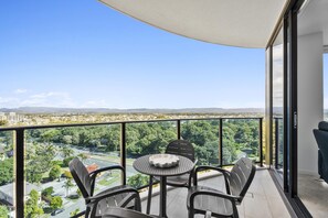 Enjoy your morning coffee in this balcony with the city and the ocean views