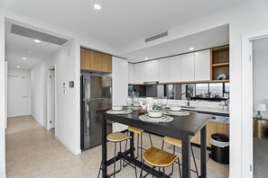 Sophisticated dining area is right next to the kitchen