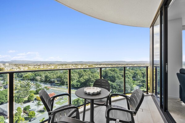 Enjoy your morning coffee in this balcony with the city and the ocean views