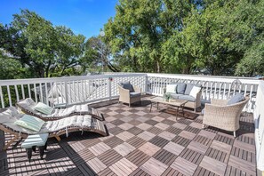 Coffee in the mornings/Wine in the evenings. Either way enjoy our roof top deck.