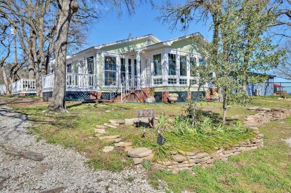 You'll love the character of this 1955 cottage with windows galore. 