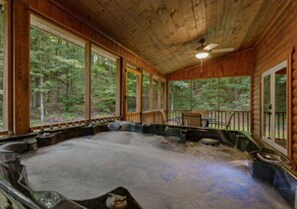 Hot tub on screened porch