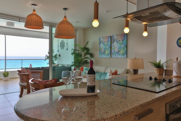 Living room with A/C, Smart Tv, Full Kitchen, Beach View.