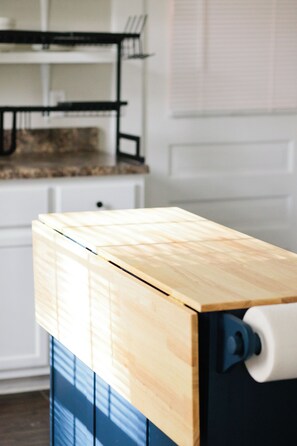 Big fan of the island for extra storage and eating space.