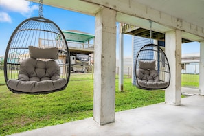 Doze off while sitting on this swing chair as the breeze sings you a lullaby