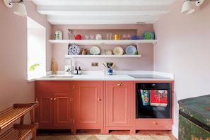 Fully equipped kitchen over looking the garden and Arundel views. 