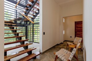 Stairs from entry to upper floors