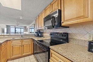 A fully stocked kitchen makes meal preparation a breeze.