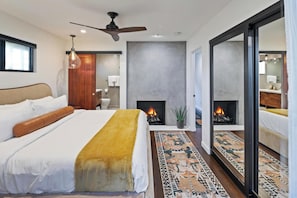 Electric fireplace for mood lighting and safety of all guests. 42" TV behind closet door.