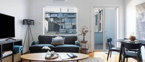 Get comfortable in the living room. Whether you’re unwinding with a book or catching up on your favourite TV.