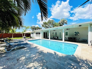 Private back yard, large heated pool, lots of sun