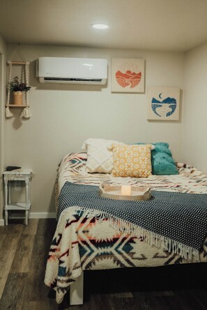 Comfortable queen sized bed with fresh linens.