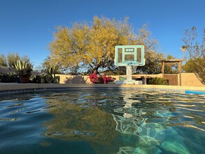Enjoy a game of basketball or just floating on one of the floats provided.
