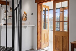 Enter through light-filled double doors