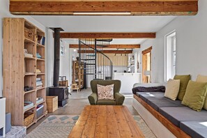 Settle in with the fireplace, smart TV, books, games, and record player