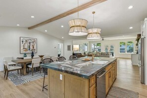 Large kitchen open to dinning and living space