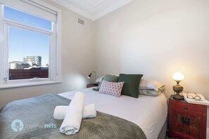Master bedroom has queen bed and block out blinds