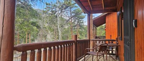 Enjoy the gorgeous views from the porch of Cabin 7.