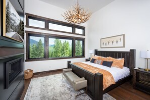 Getaway in the master bedroom with views of Whitefish Mountain Resort out the huge east facing windows.