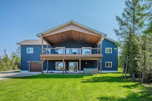 The beautiful waterfront side of the property. Please note, the hot tub is no longer available. 